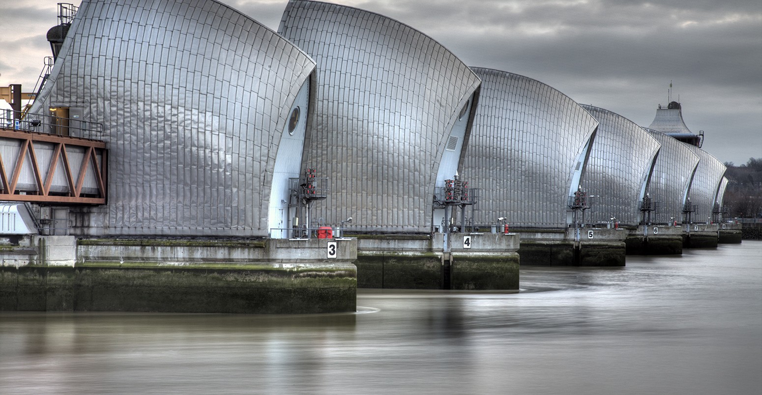 Six of the nine concrete piers of the Thames Barrier. It's the world's second largest movable flood barrier, located downstream of central London in the area of Silvertown.