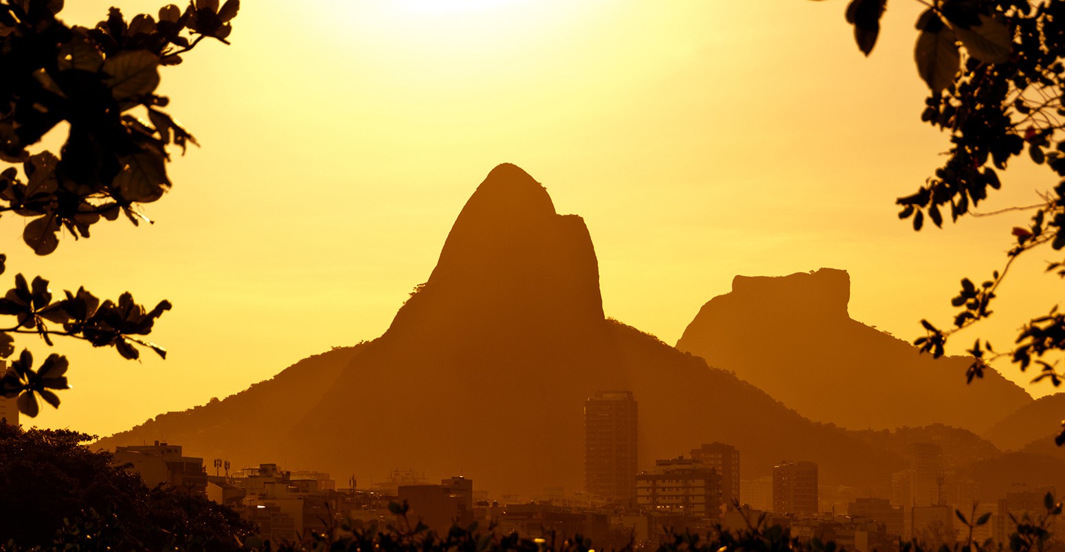 Sun goes down behind the mountains of Rio de Janeiro