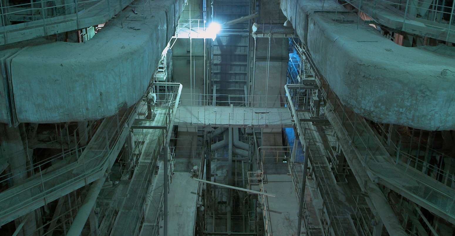 Equipment, cables and piping as found inside of a modern industrial power plant