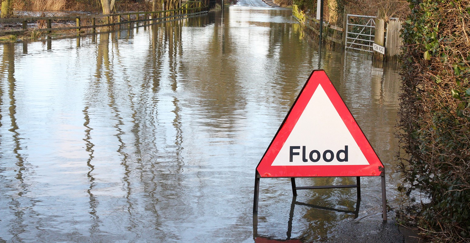 Flooded UK countryside road