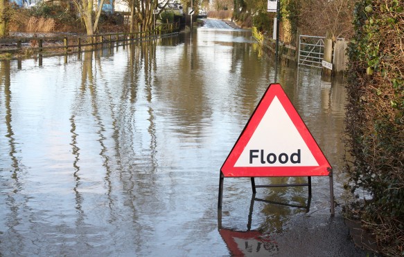 Flooded UK countryside road