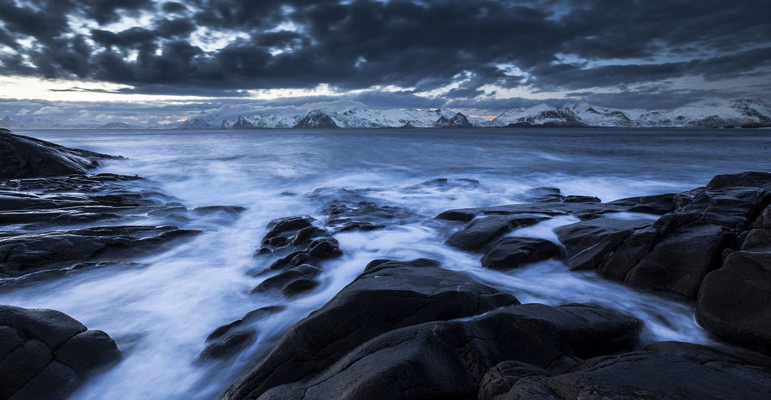 Surf on rocky coast, Norway