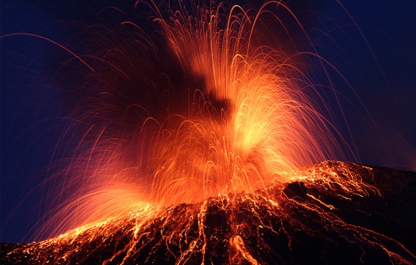 Stromboli volcano erupting at night