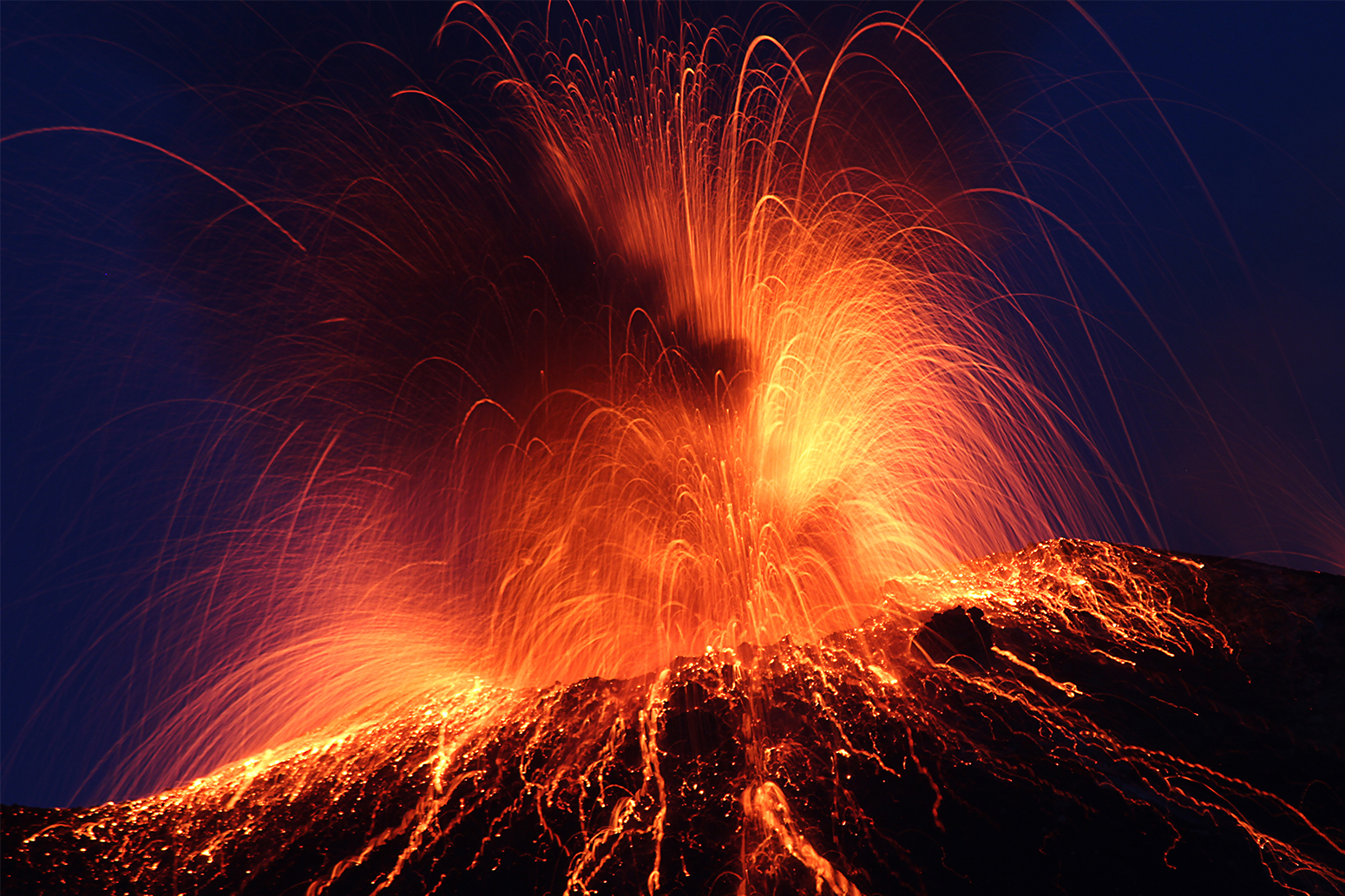 Volcano Explosion At Night