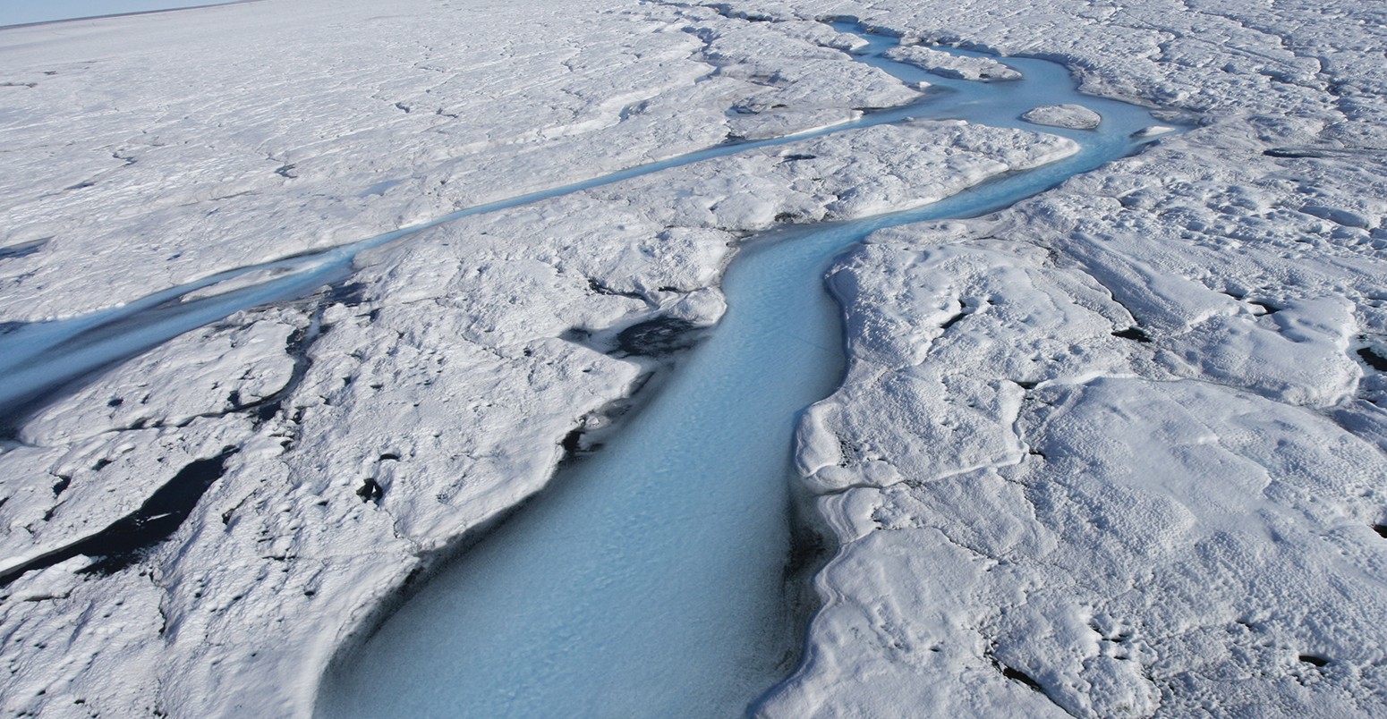Melting ice forms rivers across the Sermeq Kujalleq Glacier