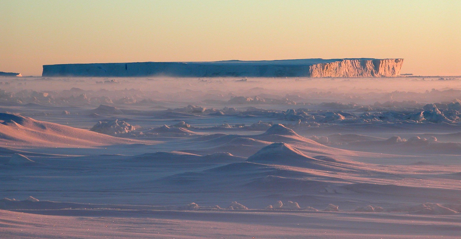 A tabular iceberg at sunset in Pine Island Bay, Antarctica.