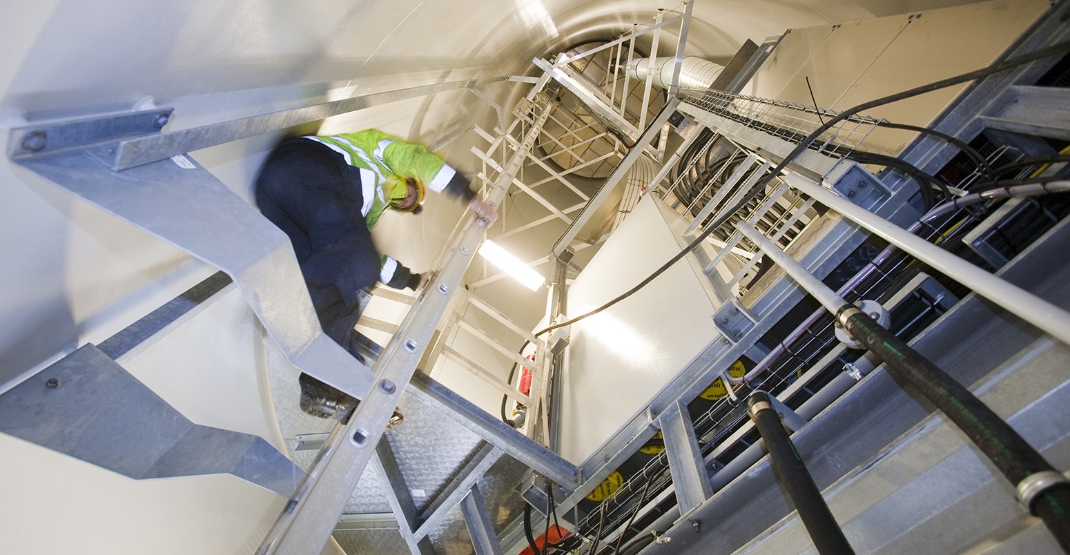 Engineer inside wind turbine at Walney Offshore Windfarm project