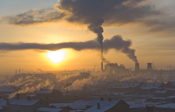 Power plant and a village in early morning in winter, north China