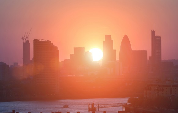 View of City of London's high rise architecture at sunset.