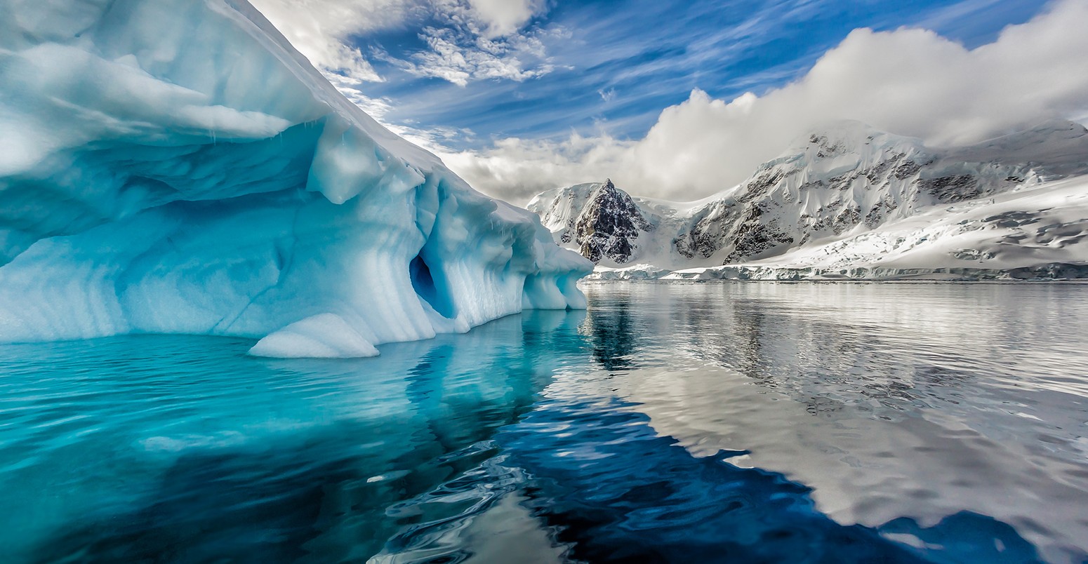 Iceberg floats in Andord Bay on Graham Land, Antarctic in November.