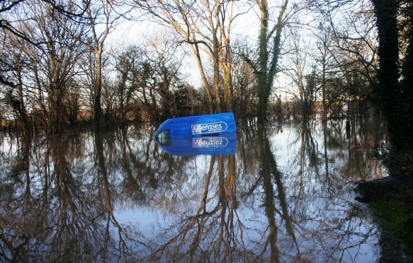 Lonely van floats in flooding in Nether Poppleton, England, United Kingdom, on 27/12/2015.