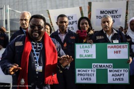 Various African and the small islands civil society groups make an action at the UN climate talks, in Paris to demand for a binding agreement that will see the temperatures reduce by 1.5 degrees celsius. © Joel Lukhovi/Survival Media Agency .