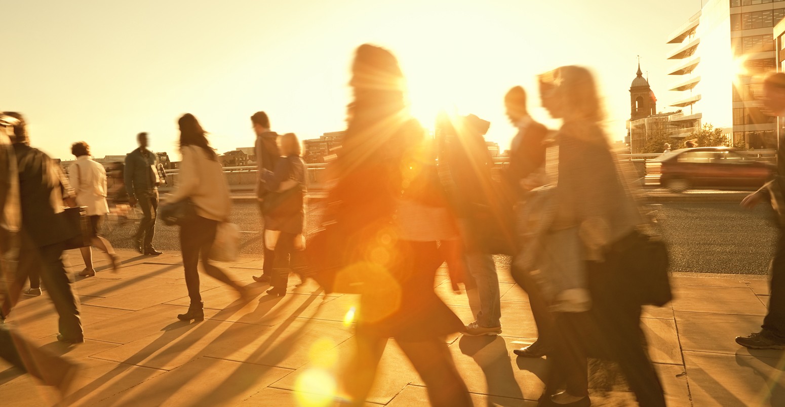 Business Commuters Walking Home After Work, Sunset Backlit, Blurred Motion