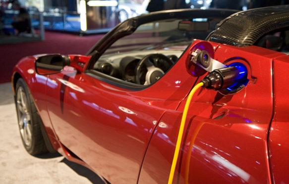 B7553C Detroit Michigan The Tesla Roadster electric vehicle on display at the North American International Auto Show