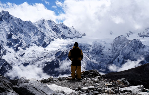 Clouds rolling into a Himalayan Valley in the afternoon, a view from Yala Glacier basecamp, Nepal.
