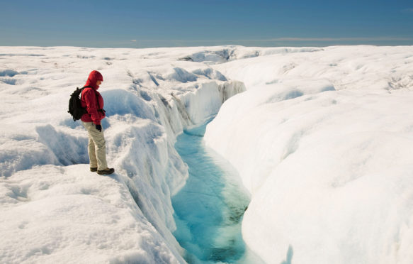 Melt water on the Greenland ice sheet near camp Victor north of Ilulissat