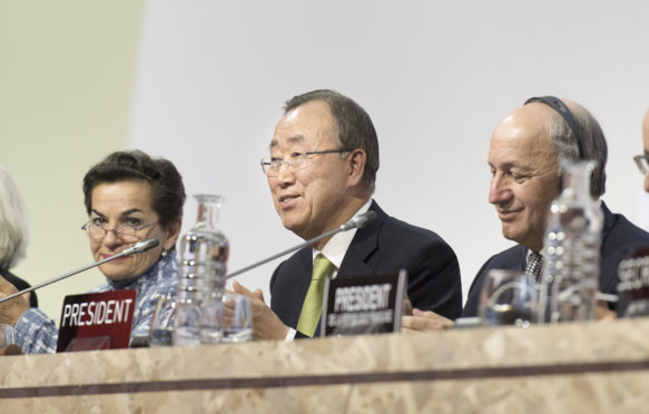 Secretary-General Ban Ki-moon (centre) during the closing ceremony of the UN Climate Change Conference in Paris (COP21)