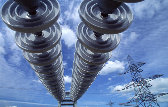 A30C8F Electricity Insulators on power line on electricity grid