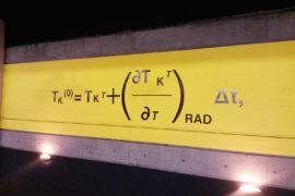 One of 42 panels displayed throughout the Gare du Nord metro station in Paris, honouring Syukuro Manabe and his contributions to climate science, to mark the COP21 UN climate change conference in 2015. The equations were used by Manabe in his seminal climate model in the late 1960s. Credit: Rosamund Pearce/Carbon Brief.