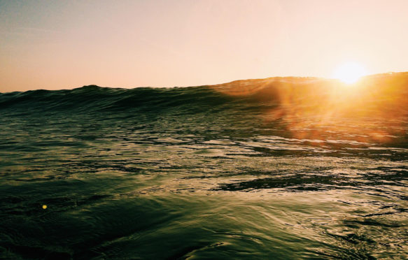 S07BF0 Sunlight over the sea. Credit: Gary Moger / Stockimo / Alamy Stock Photo