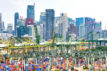 PSA International Brani Container Terminal with the CBD skyline, Brani Island, Singapore. Credit: Jason Knott / Alamy Stock Photo. FGRPBF