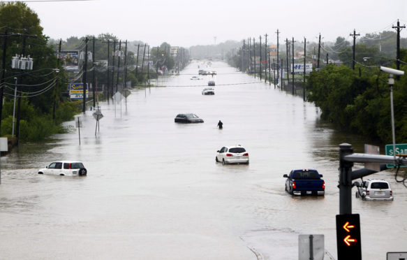 Vehicles stranded in flood during Hurricane Harvey in Houston, US on 27 August 2017. Credit: Song Qiong/Xinhua/Alamy Live News. K1RX0B