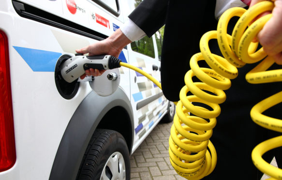 C5GY5X Electric vehicle, van. Powered by electricity. Charging the batteries.