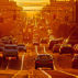 Setting sun shines on afternoon traffic on Taraval Street in San Francisco. Credit: MarmadukeSt. John / Alamy Stock Photo. DR8AK8