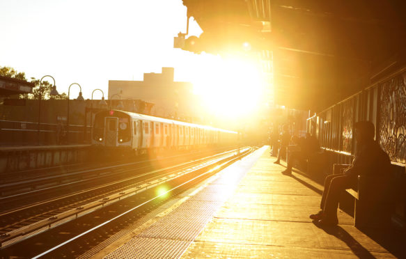 Sun shines on a subway station in Brooklyn, New York. Credit: Andrew Cribb / Alamy Stock Photo. H6FCM3