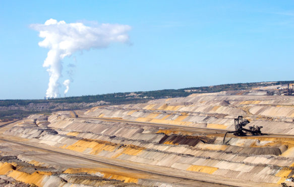 Open coal mine in Garzweiler, Germany. Credit: JLBvdWOLF / Alamy Stock Photo. D36T92