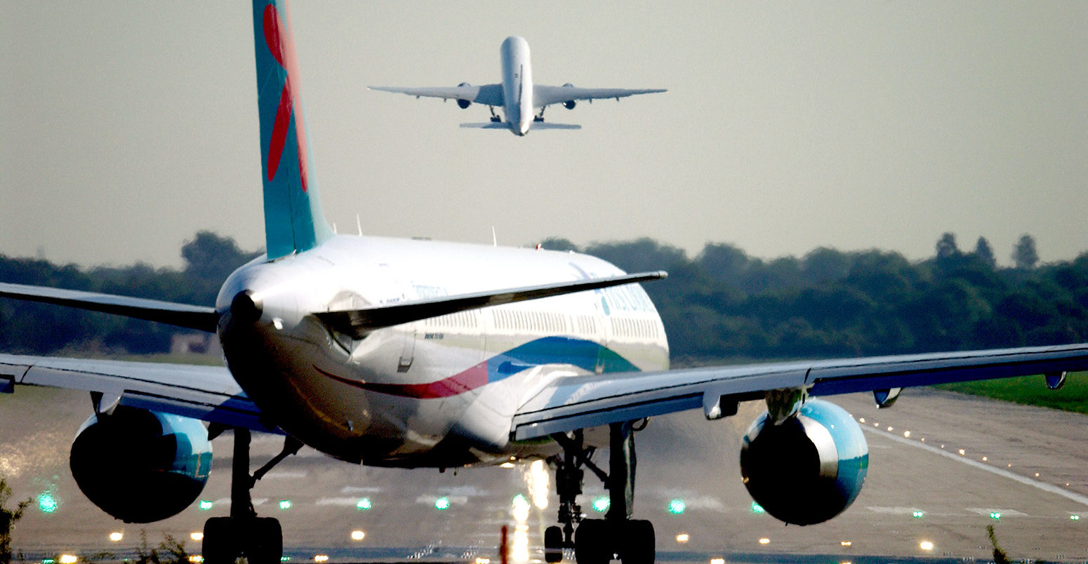 A plane prepares for takeoff from London Gatwick airport at dawn. Credit: Roger Bamber / Alamy Stock Photo. AM1G59