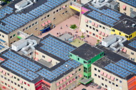 Solar panels cover the roof of a school, Zwolle, Netherlands. Credit: frans lemmens / Alamy Stock Photo. DHW93T