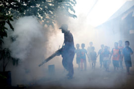 Mosquito fogging to prevent against Dengue fever in Jakarta, Indonesia, 30 March 2015. Credit: Reynold Sumayku / Alamy Stock Photo. EJNEYB