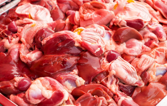 Liver, heart and gizzard at a market. Credit: Truengtra Paejai / Alamy Stock Photo. J2N7NR