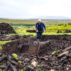 Blocks of peat being cut in Connemara National Park, Republic of Ireland. Credit: robertharding / Alamy Stock Photo.