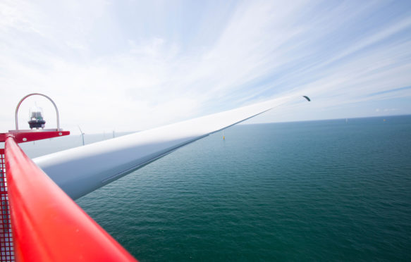 The blade of a wind turbine from the nacelle, in the Walney offshore wind farm, Cumbria, UK.