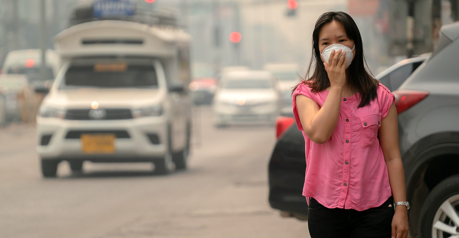 A woman wears a protective mask in Chiang Mai, Thailand. Credit: Anan Kaewkhammul / Alamy Stock Photo. T19P7D