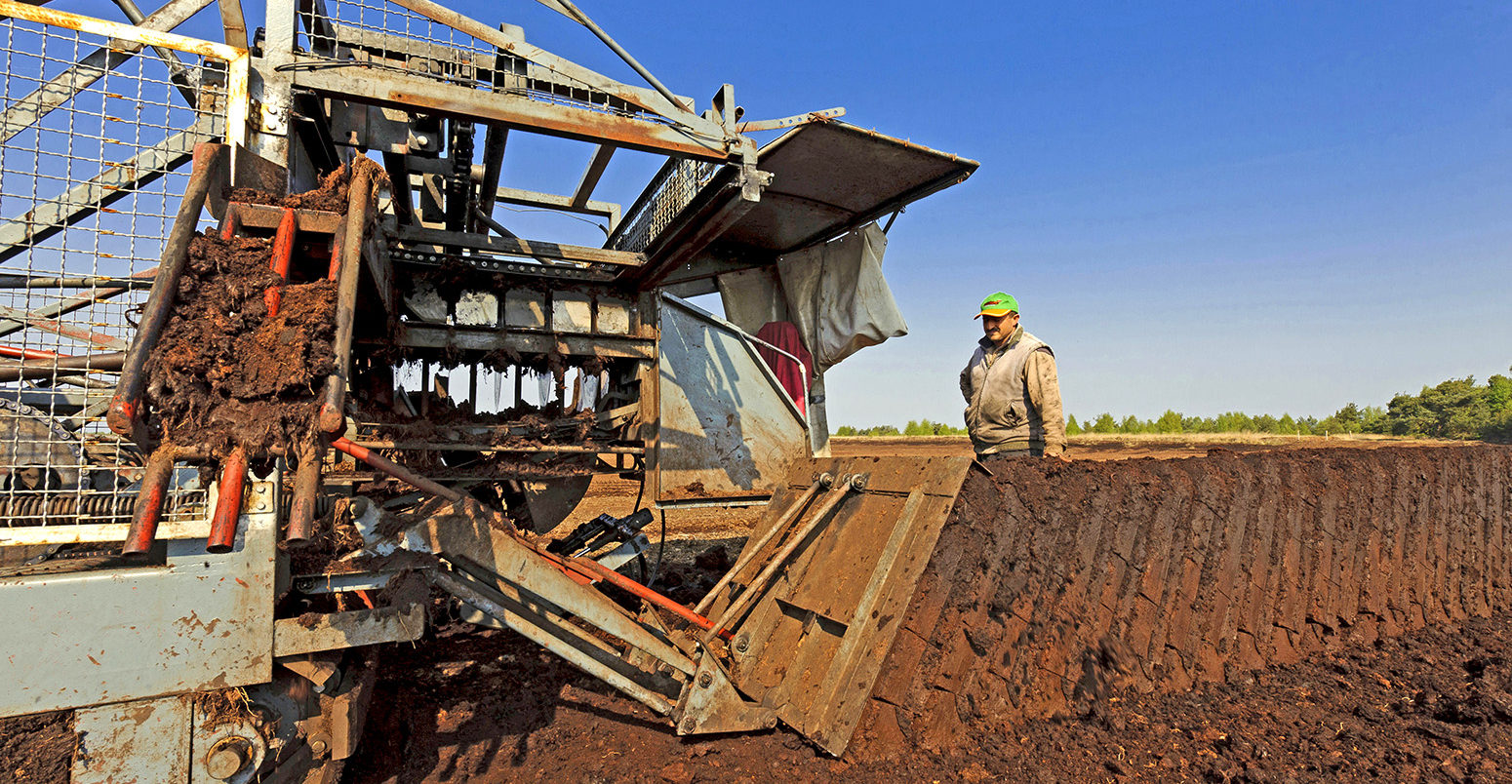 Peat-cutting in Goldenstedt Moor, Germany. Credit: blickwinkel / Alamy Stock Photo. EBTGWY