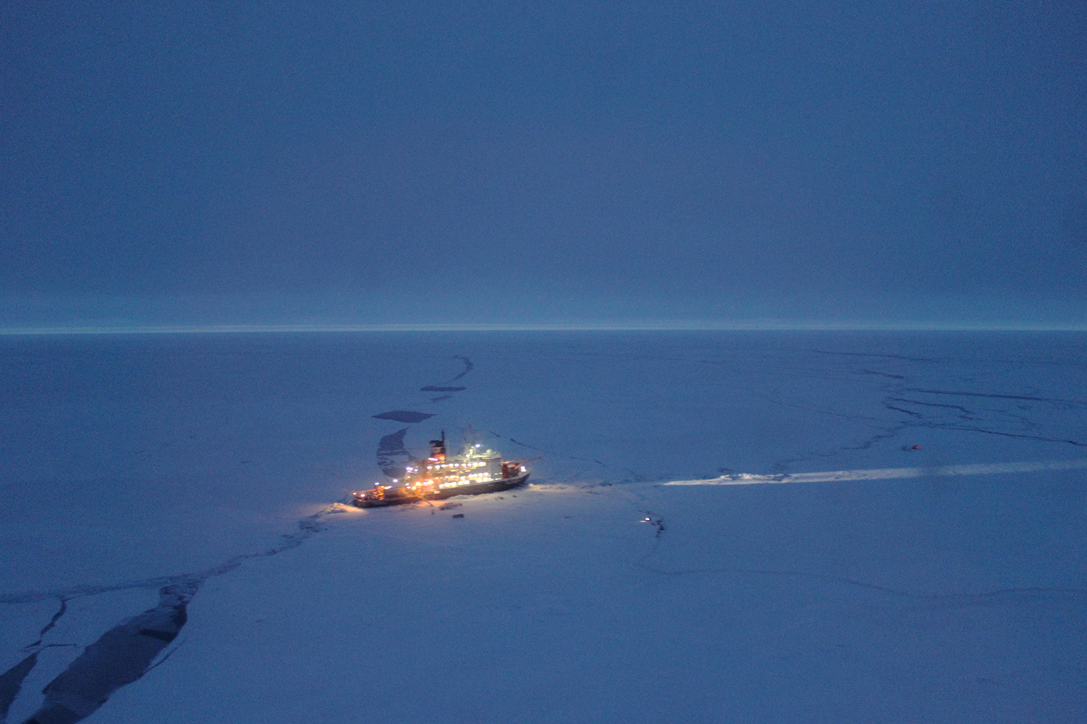 The Polarstern moored to an ice floe in the Central Arctic Ocean, as viewed from the window of an Mi-8 helicopter. 