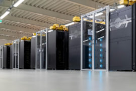 Computer cabinets located in the German Climate Computing Centre which form the supercomputer "Mistral". Credit: Felix König/dpa/Alamy Live News