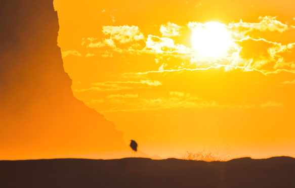 Sunrise over cliffs off Garie Beach in Royal National park, Australia. Credit: Taras Vyshnya / Alamy Stock Photo. JJBFMF