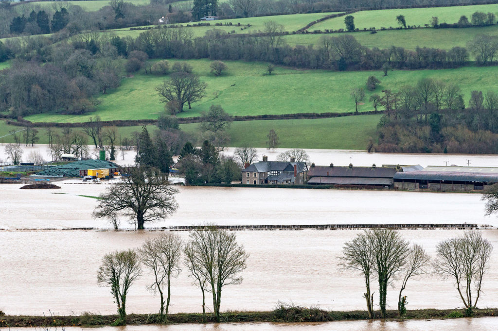View of the river Wye flooding near Hay-on-Wye, Herefordshire, 16 Feb 2020. Credit: Alex Ramsay / Alamy Stock Photo. 2AYTWYM