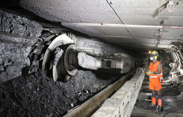 Coal miner working in a mine in Knottingley, West Yorkshire. June 2012. Credit: Image Source / Alamy Stock Photo