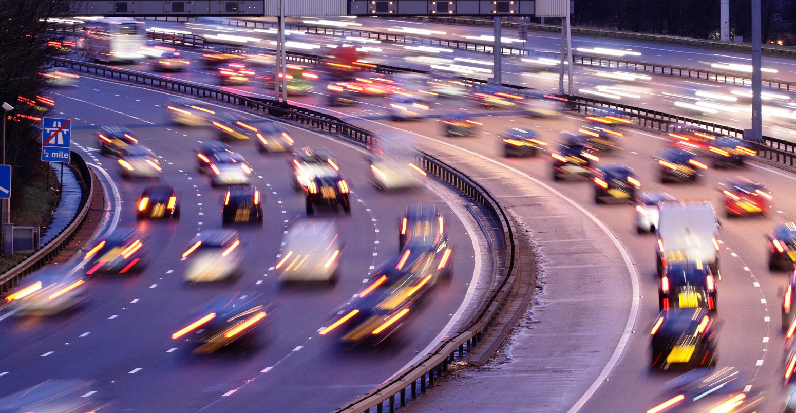 Early morning traffic on the M8 Motorway in Glasgow, Scotland. Credit: Kenny Williamson / Alamy Stock Photo