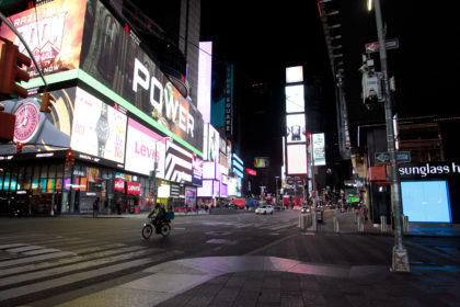 A largely empty Times Square during the Coronavirus pandemic, New York City. 21 March 2020. Credit: Adam Stoltman / Alamy Stock Photo