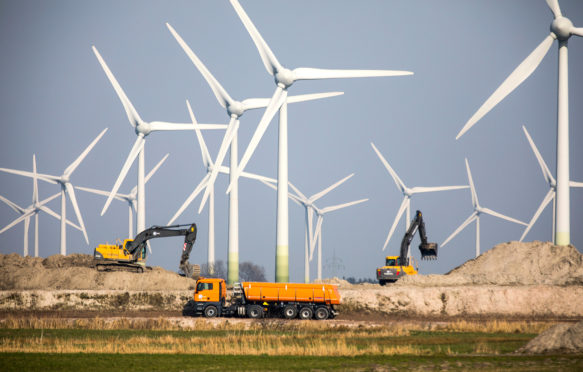 Wind farm construction in northern Germany. Credit: Jochen Tack / Alamy Stock Photo. HWB29A