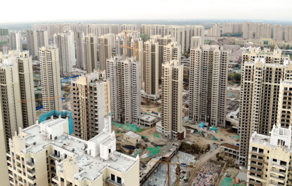 Aerial view of residential buildings under construction in Tianjin, China. Credit: Bonandbon / Alamy Stock Photo. 2A7D9WK