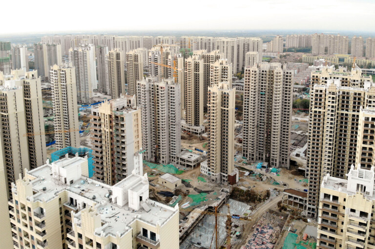 Aerial view of residential buildings under construction in Tianjin, China. Credit: Bonandbon / Alamy Stock Photo. 2A7D9WK