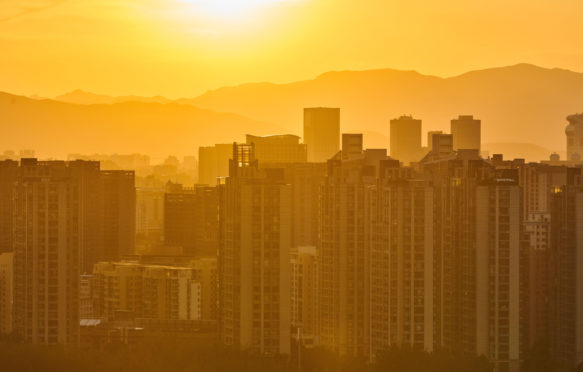 Beijing landmarks, including the China Zun, stand to form a skyline at sunset