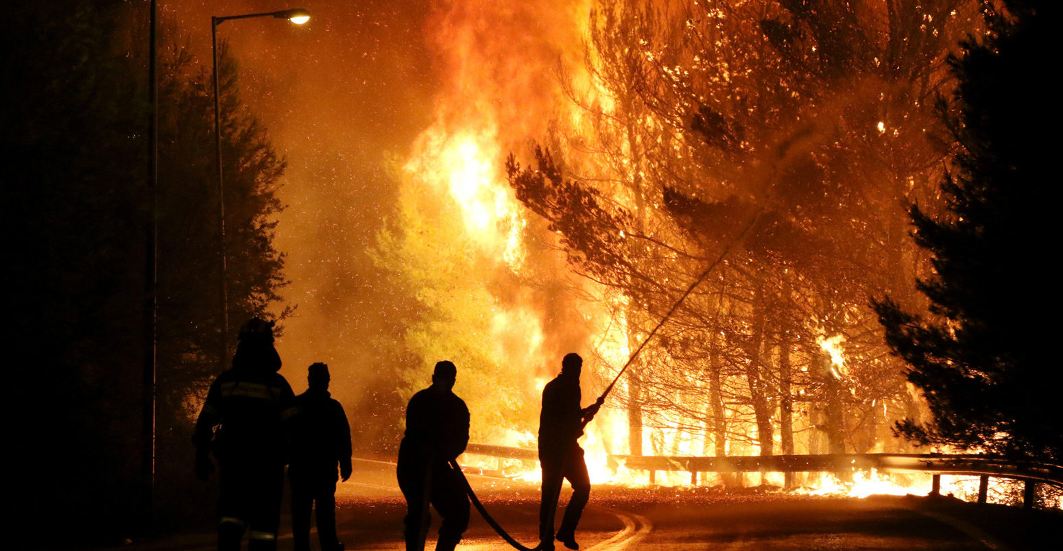 Firemen battle with the flames in Kalamos 2017.